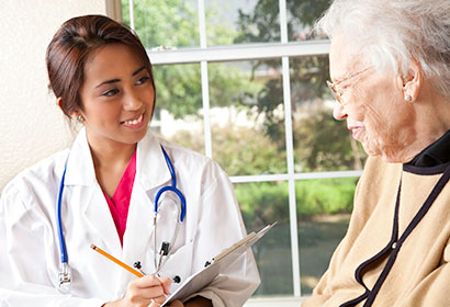 iStock-157684185_XL_female-doctor-senior-woman_web Doctor Talking with Patient